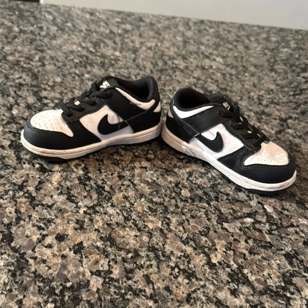 Nike slip on Black and White Sneakers EUC 8.5